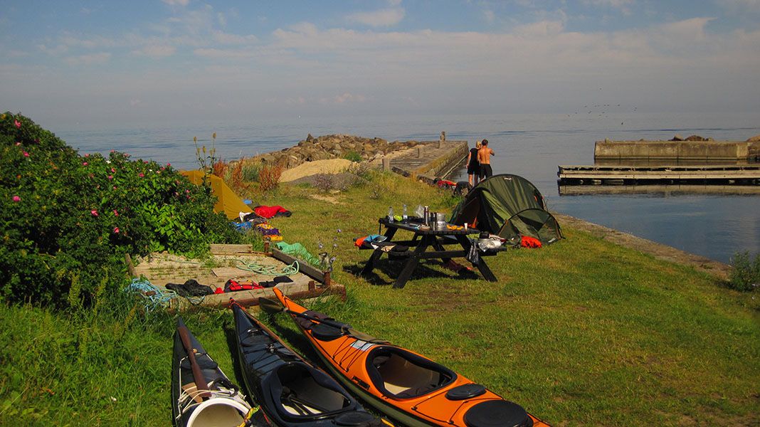 Kajakker i solnedgang